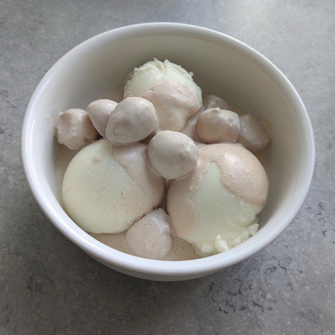 Served with Melon Balls Infused in Brandy + Cream